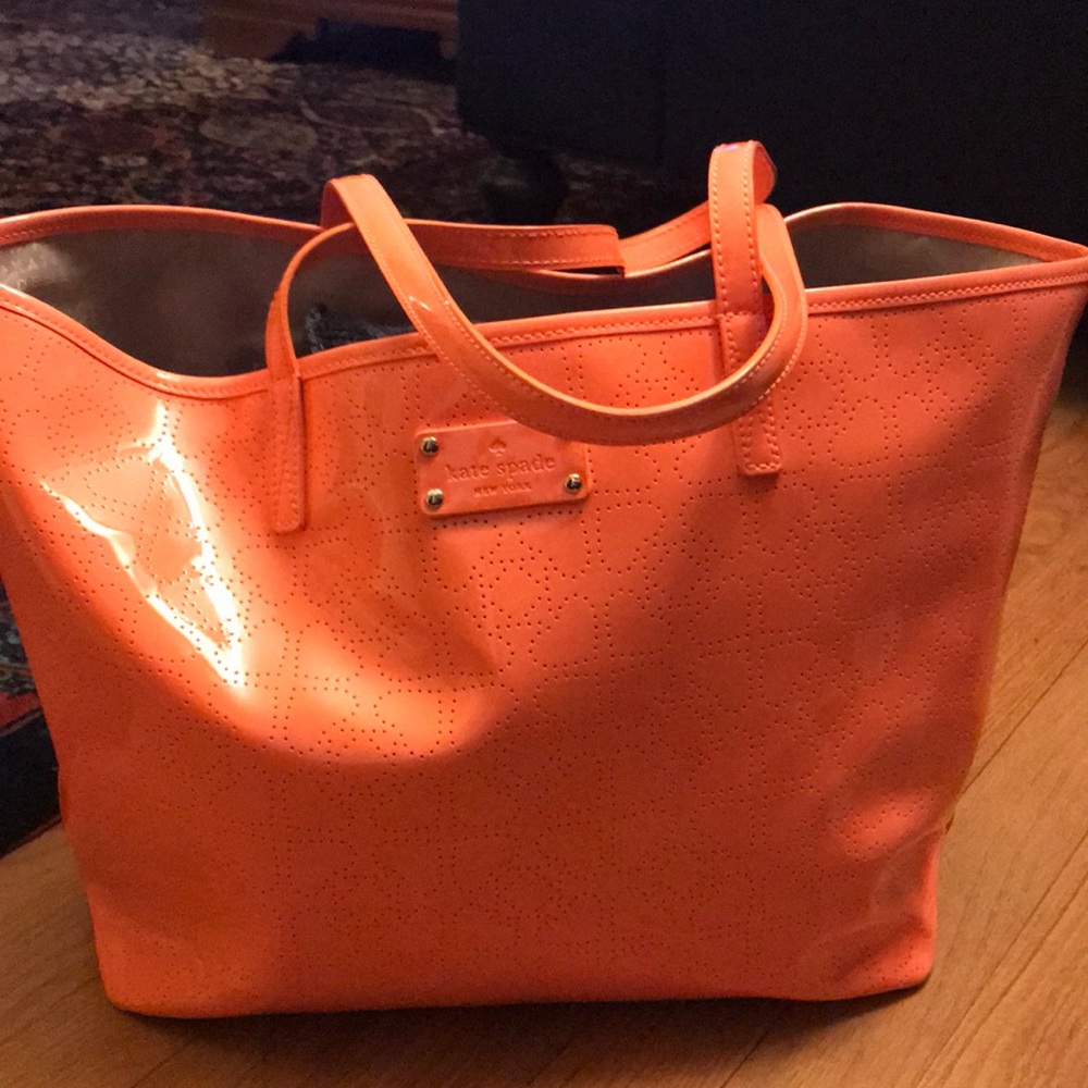 Bright orange Kate Spade tote bag